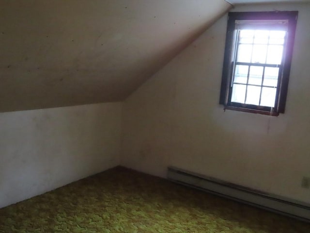 bonus room with carpet, lofted ceiling, and a baseboard radiator