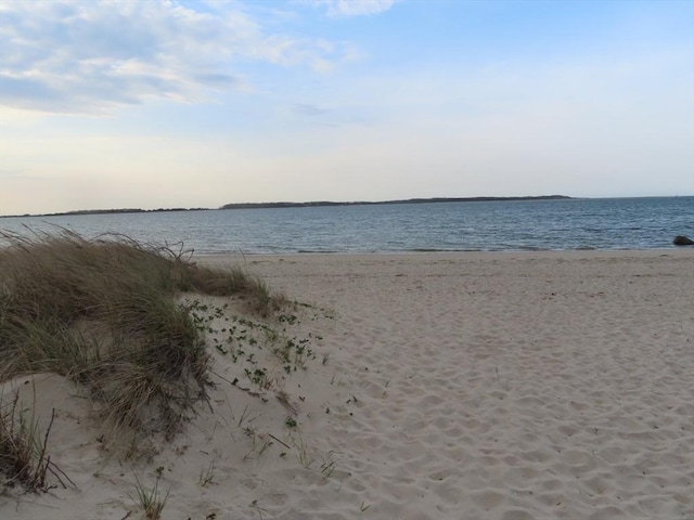 property view of water featuring a view of the beach