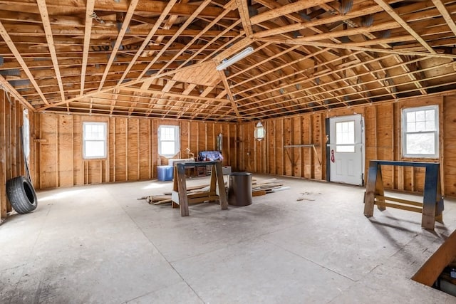 misc room with vaulted ceiling and a wealth of natural light