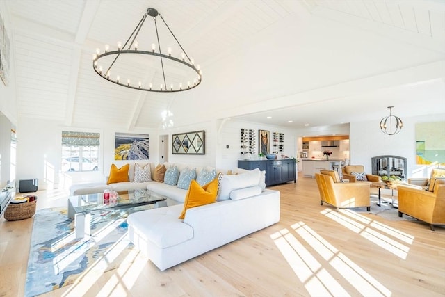 61 Chickering Rd, Spencer, MA 01562 - living area with a chandelier, light wood finished floors, and wood ceiling