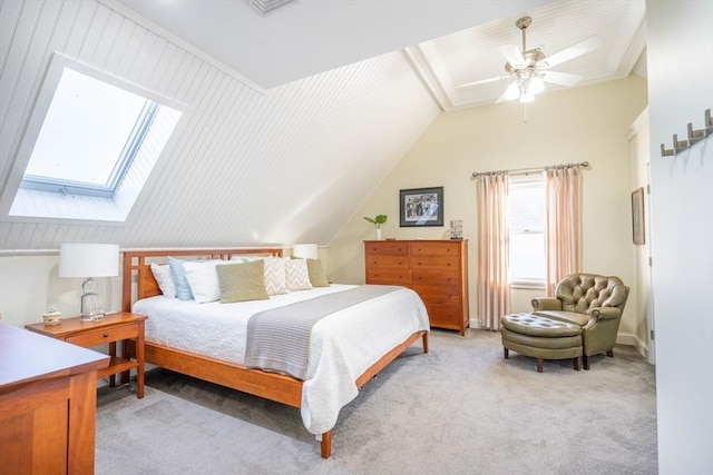 61 Chickering Rd, Spencer, MA 01562 - bedroom with multiple windows, lofted ceiling, a skylight, light colored carpet, and a ceiling fan