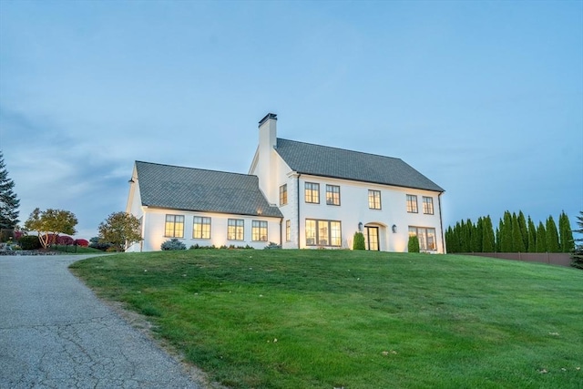 61 Chickering Rd, Spencer, MA 01562 - view of front of home featuring a chimney and a front lawn