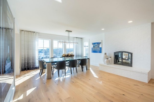 61 Chickering Rd, Spencer, MA 01562 - dining room featuring light wood-type flooring, a fireplace, and recessed lighting