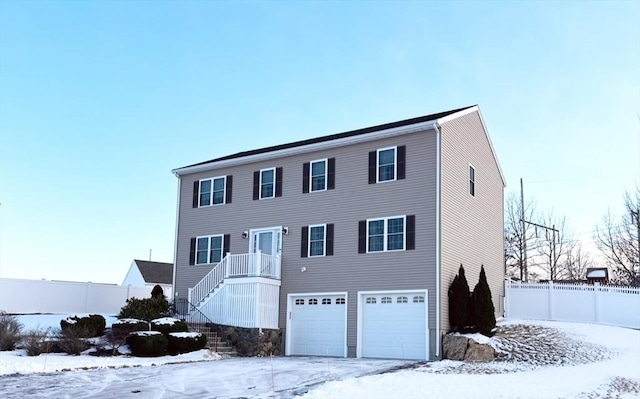 view of front of property with a garage