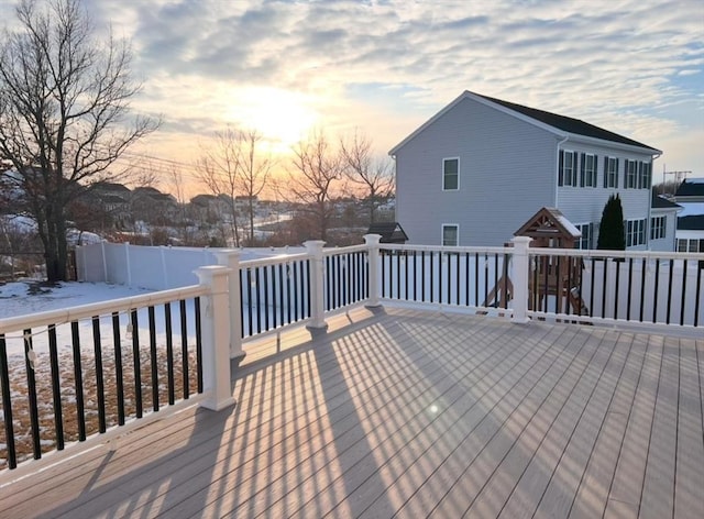 view of snow covered deck