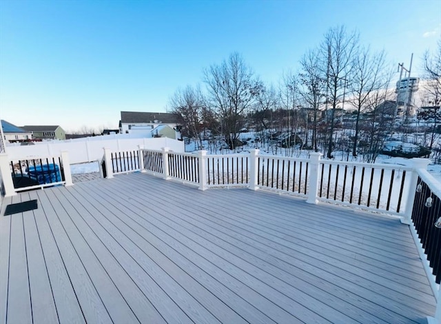 view of snow covered deck