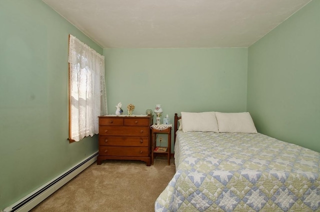 bedroom with a baseboard radiator and light carpet