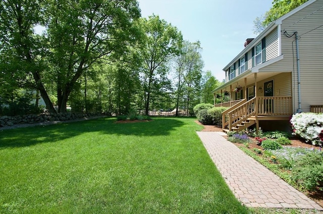 view of yard featuring a porch