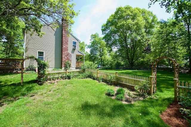 view of yard featuring a wooden deck