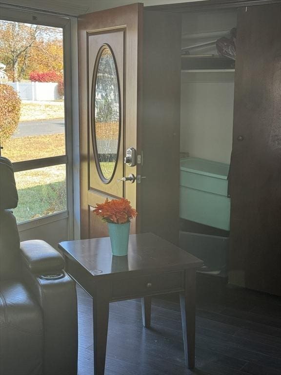 dining area with wood finished floors