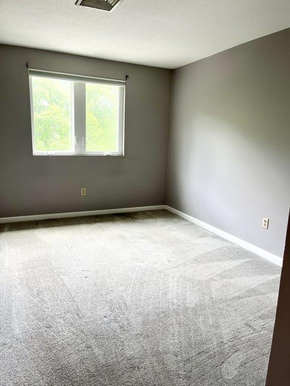 38 Dunham Rd Unit 303, Beverly, MA 01915 - carpeted empty room with baseboards