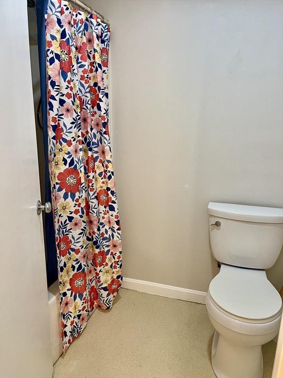 38 Dunham Rd Unit 303, Beverly, MA 01915 - bathroom with toilet and baseboards