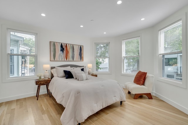 bedroom featuring light hardwood / wood-style floors