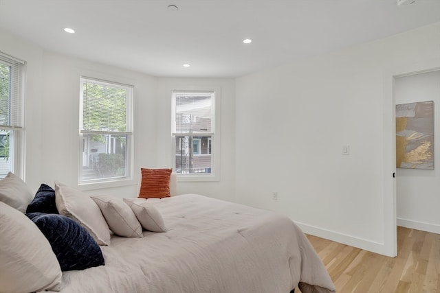 bedroom featuring light hardwood / wood-style floors