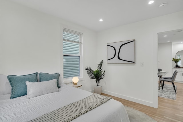 bedroom featuring light wood-type flooring