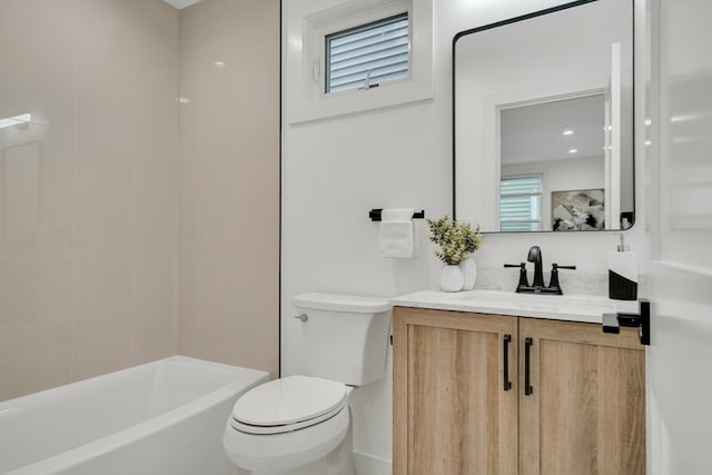 full bathroom featuring  shower combination, vanity, and toilet