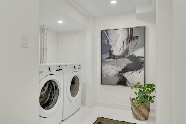 laundry room with washer and dryer