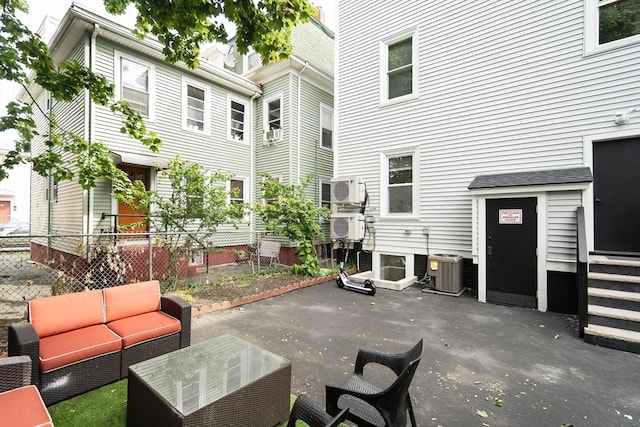 view of patio / terrace featuring cooling unit, ac unit, and central AC