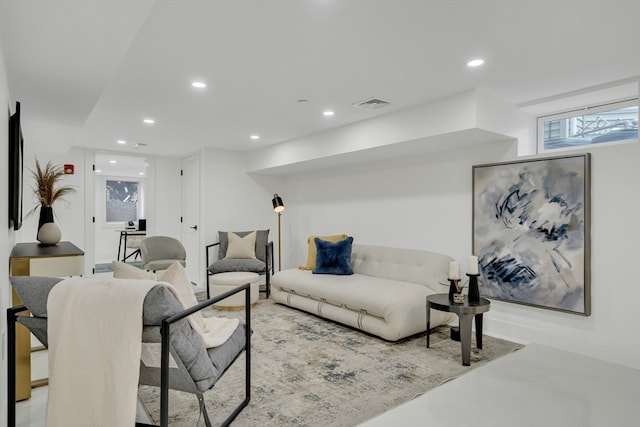 living room with concrete flooring