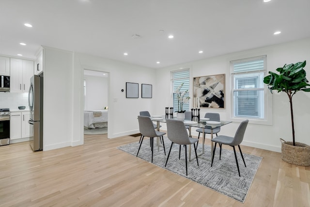 dining room featuring light wood-type flooring