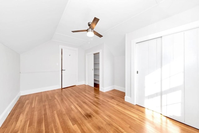 bonus room featuring lofted ceiling, light hardwood / wood-style flooring, and ceiling fan