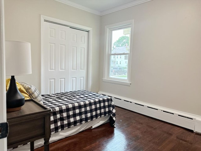 31 Horton St, Attleboro, MA 02703 - bedroom featuring a baseboard heating unit, ornamental molding, wood finished floors, and a closet