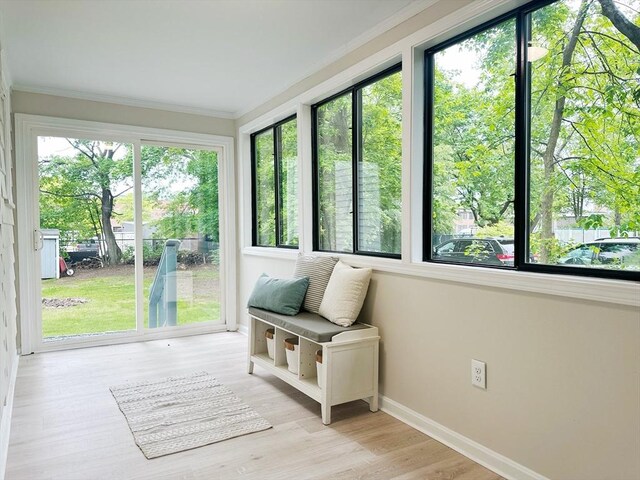 31 Horton St, Attleboro, MA 02703 - sunroom with ornamental molding, baseboards, and wood finished floors