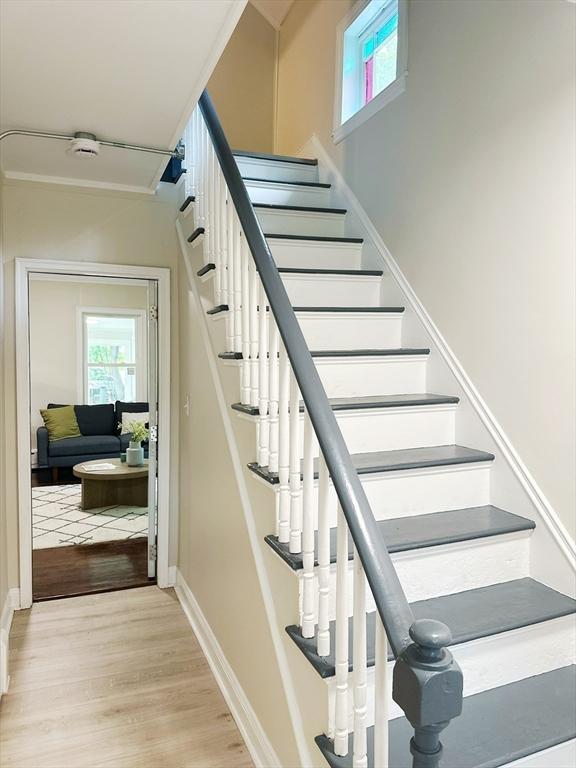 31 Horton St, Attleboro, MA 02703 - staircase featuring wood finished floors and baseboards