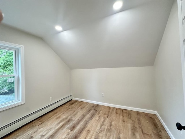 31 Horton St, Attleboro, MA 02703 - bonus room with a baseboard heating unit, lofted ceiling, wood finished floors, baseboards, and recessed lighting