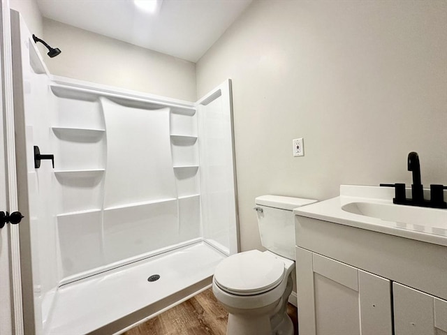 31 Horton St, Attleboro, MA 02703 - full bathroom featuring wood finished floors, vanity, toilet, and a shower