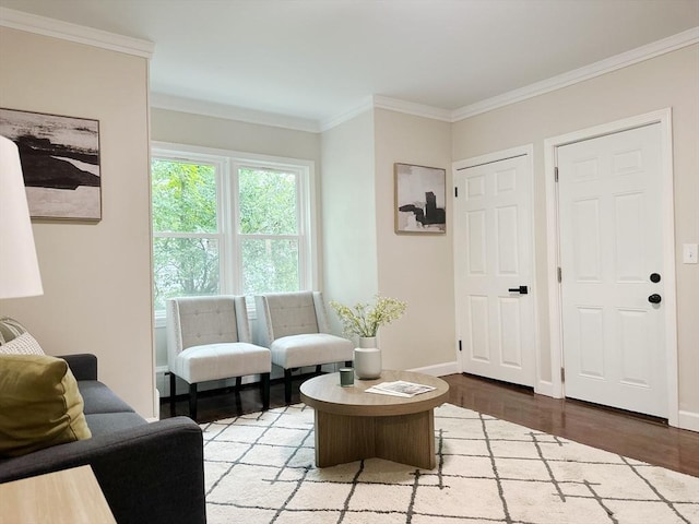 31 Horton St, Attleboro, MA 02703 - living area featuring ornamental molding, wood finished floors, and baseboards
