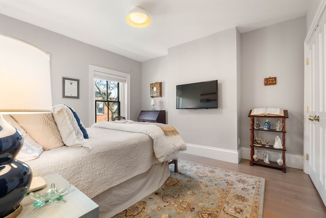 bedroom featuring hardwood / wood-style floors