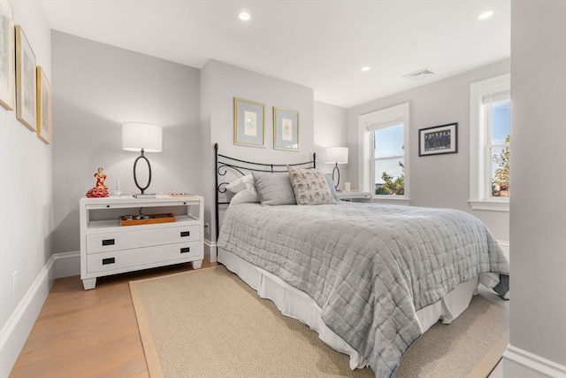 bedroom with light wood-type flooring