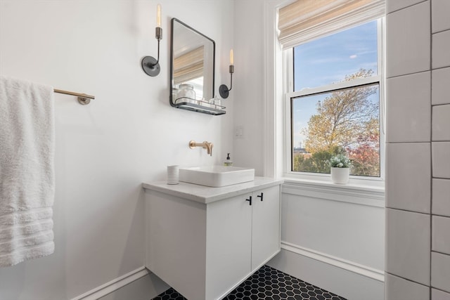 bathroom with vanity and tile patterned floors