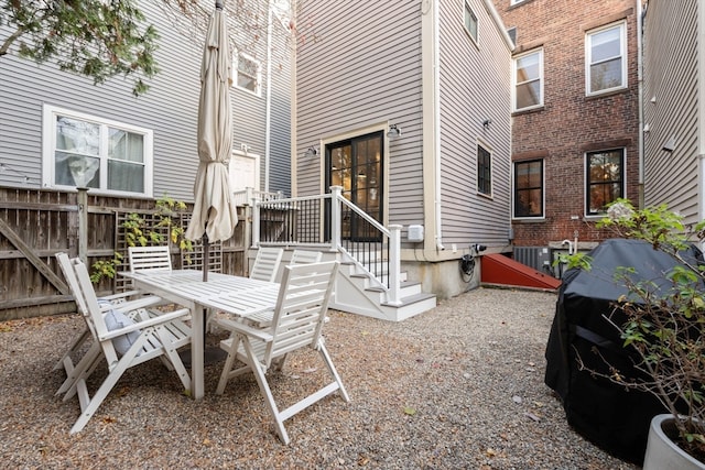 view of patio / terrace with area for grilling and cooling unit