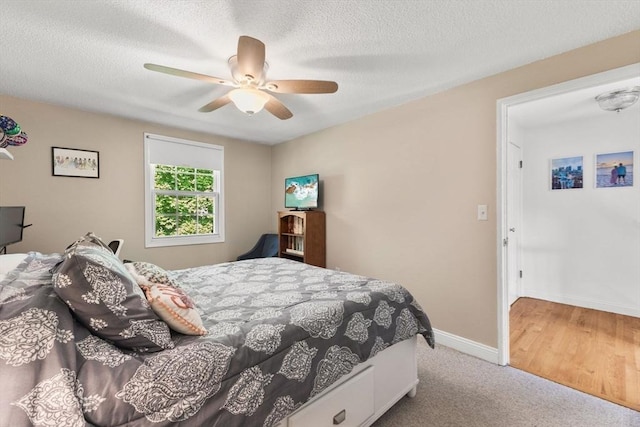 112 Cocasset St Unit 3, Foxboro, MA 02035 - carpeted bedroom with baseboards, ceiling fan, and a textured ceiling