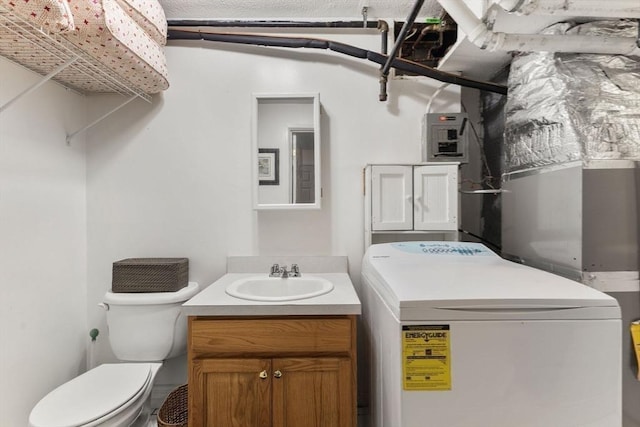 112 Cocasset St Unit 3, Foxboro, MA 02035 - washroom featuring washer / clothes dryer and a sink
