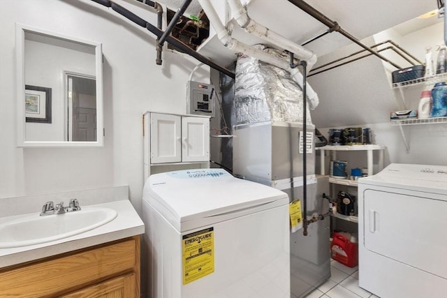 112 Cocasset St Unit 3, Foxboro, MA 02035 - laundry area with washing machine and clothes dryer, cabinet space, and light tile patterned floors