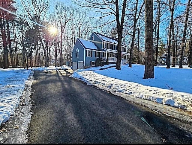 view of road with aphalt driveway