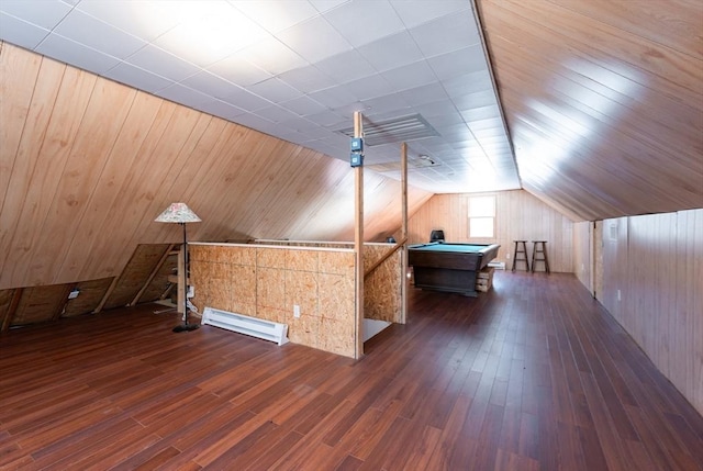 bonus room featuring a baseboard radiator, wood finished floors, wood walls, and vaulted ceiling