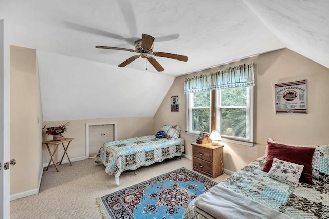 bedroom with ceiling fan, light colored carpet, and lofted ceiling