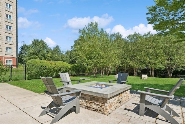 view of patio featuring an outdoor fire pit