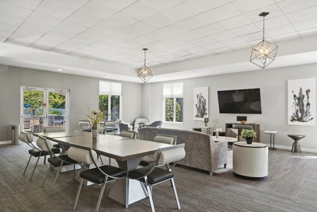 dining room featuring baseboards