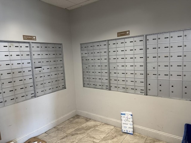 view of property's community with mail area