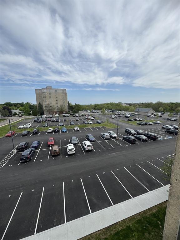 view of uncovered parking lot