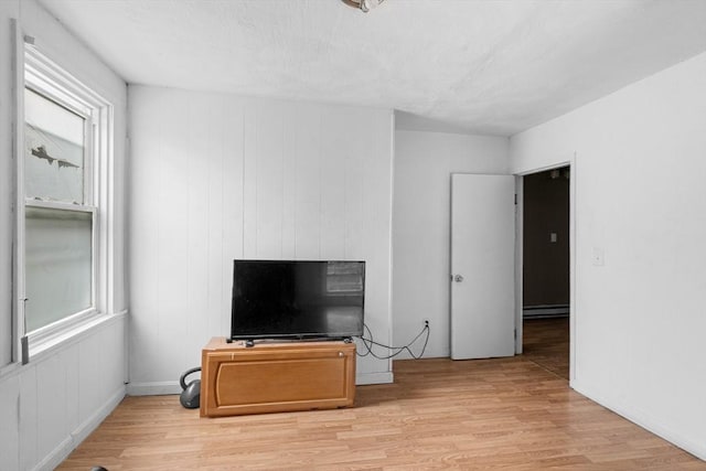 686-688 E Ave, Warwick, RI 02886 - unfurnished living room featuring light wood-style flooring and baseboards