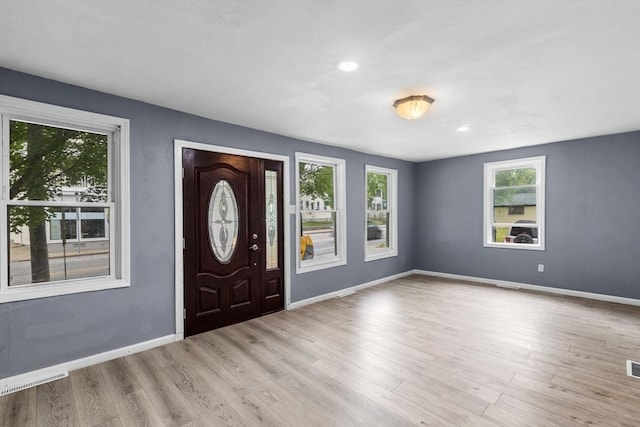 686-688 E Ave, Warwick, RI 02886 - foyer with plenty of natural light, wood finished floors, and recessed lighting