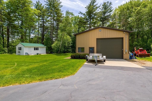 9 Treadwell Ter, Spencer, MA 01562 - detached garage with view of scattered trees and driveway