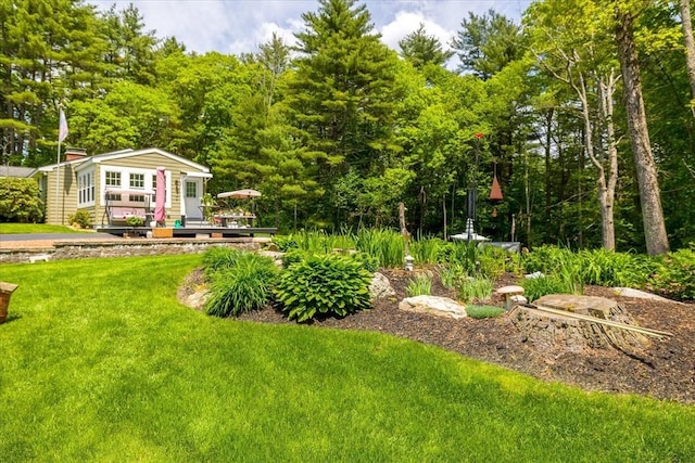 9 Treadwell Ter, Spencer, MA 01562 - view of green lawn featuring an outbuilding and a wooden deck