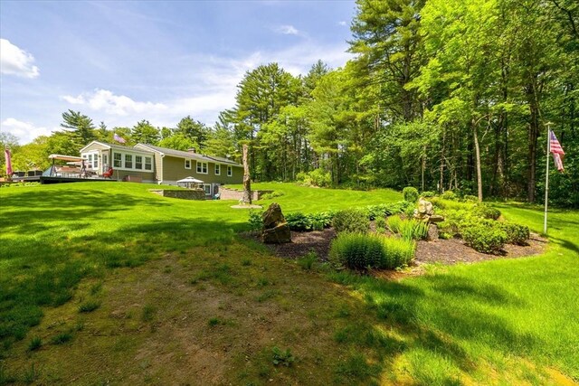 9 Treadwell Ter, Spencer, MA 01562 - view of grassy yard featuring a wooden deck